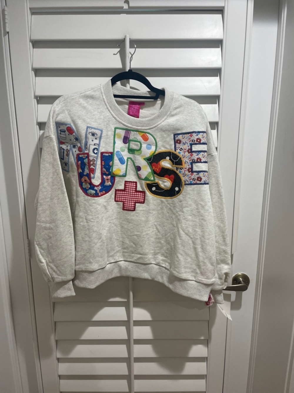 Queen of sparkles nurse sweater